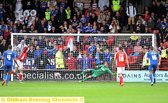 PAYING THE PENALTY: Athletic go two goals down as Tom Bradshaw sends Joel Coleman the wrong way with his spot-kick. 