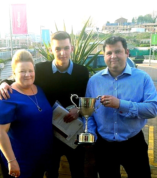 Reece Hunt (centre) with Bryan and Eve Townson of the Eagle and Child pub, Ramsbottom