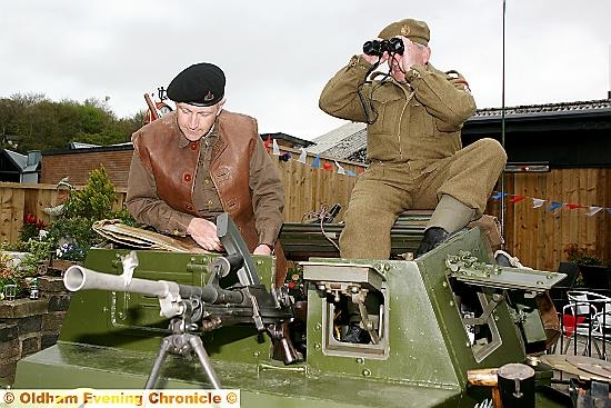 Alister Scott (l) and Rodger Breeton on a Daimler scout that helped to patrol the streets of London in 1945. 