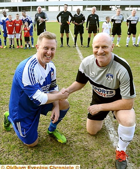 Captains Nathan Ashcroft and former Oldham star Andy Ritchie (right)
