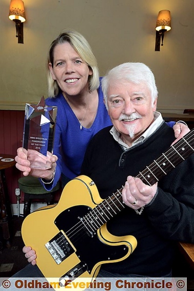 FUNDRAISER of the year . . . John Loydon (JSL) with his Fundraiser of the Year award from NMO Spectrum UK and Granby Arms landlady Deborah Hardie