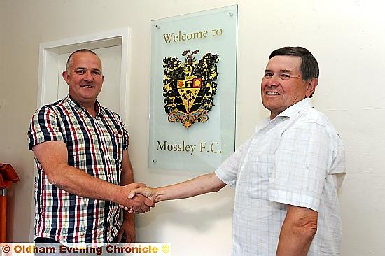 HAPPIER TIMES: former Borough chairman Mark Kilgannon (left) is welcomed to Mossley’s Seel Park by Lilywhites director Steve Tague last summer. HAPPIER TIMES: former Borough chairman Mark Kilgannon (left) is welcomed to Mossley’s Seel Park by Lilywhites director Steve Tague last summer.