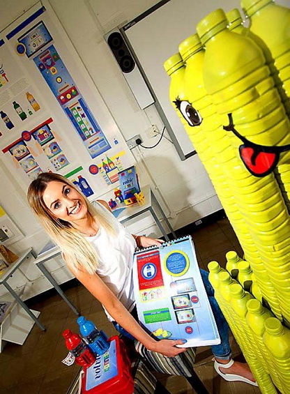 Kimberley with one of mher bottle sculptures