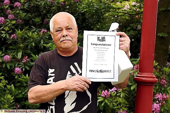 Keith with his prize certificate - all he’s taking from his win