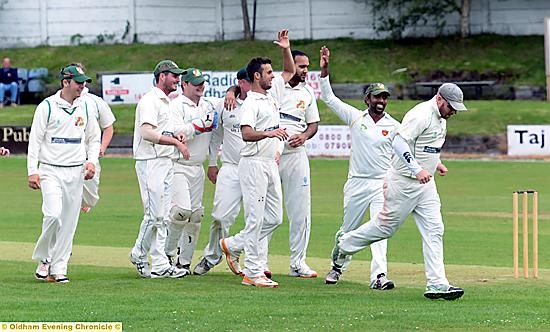 Royton celebrate Adam’s Good’s wicket of Shubham Harke. Royton celebrate Adam’s Good’s wicket of Shubham Harke.