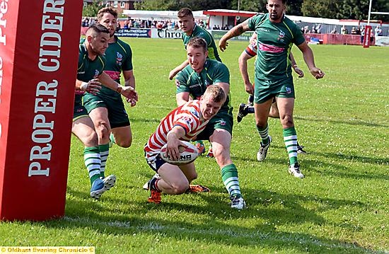 Gary Owen scores under the posts.