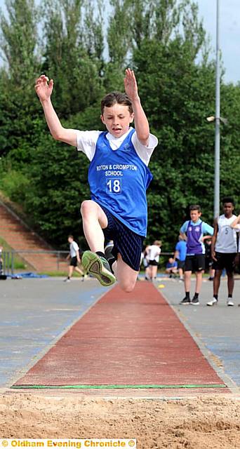 GOLDEN BOY: Year Seven long jump winner Owen Pritchard from Royton and Crompton. GOLDEN BOY: Year Seven long jump winner Owen Pritchard from Royton and Crompton.