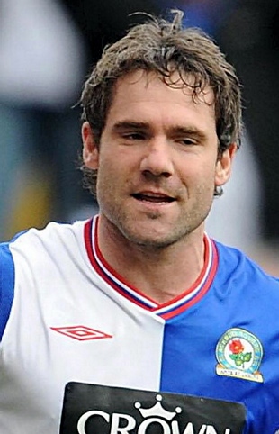 DAVID DUNN . . . in the directors’ box