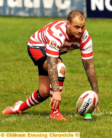 LINED UP: Steve Roper prepares to kick for goal.