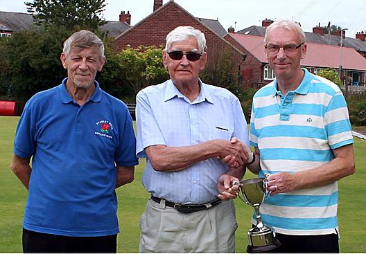 John Atkinson (left) and Price are pictured either side of league president Bill Connolly at the presentation. John Atkinson (left) and Price are pictured either side of league president Bill Connolly at the presentation.