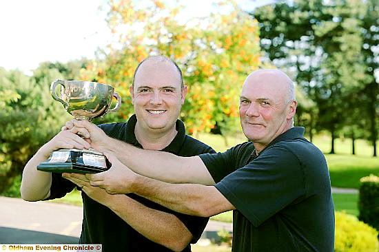 HANDS OFF, IT’S MINE . . .Lee Rowbotham (left) after thwarting his dad, Paul. HANDS OFF, IT’S MINE . . .Lee Rowbotham (left) after thwarting his dad, Paul.