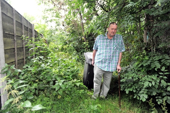 Ian Graham drags his bin through the jungle Ian Graham drags his bin through the jungle