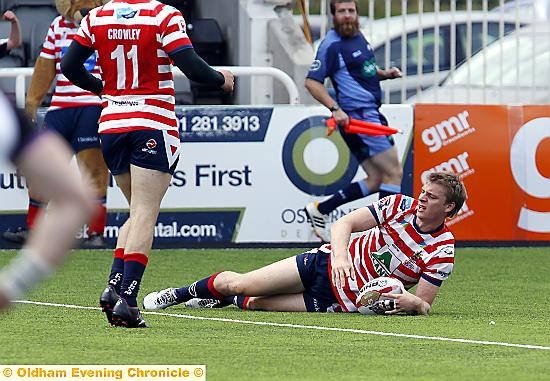 two-try centre Jon Ford touches down for the visitors. 
