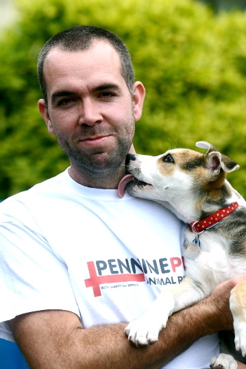 Animal lover Michael Waugh with Dennis, a new arrival at the animal shelter