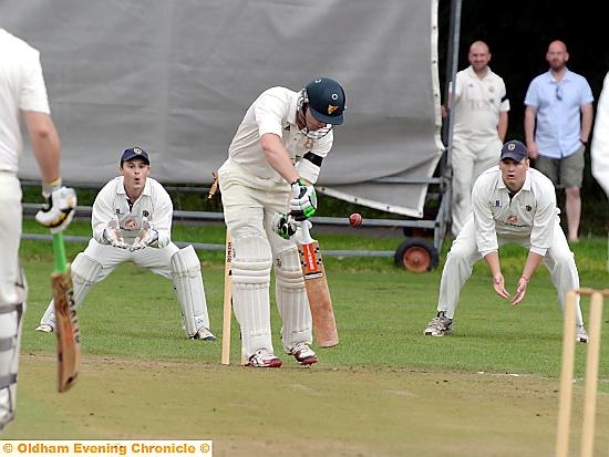 HE’S GONE . . . Saddleworth batsman Michael Jones is bowled by Adam Robinson. 