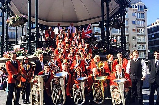 POIGNANT trip: band members pose for a picture