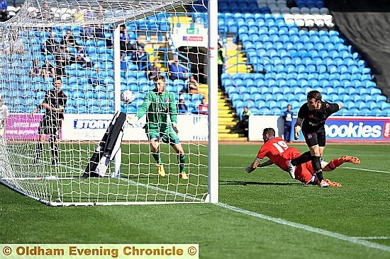 Athletic forward Rhys Murphy (left) reduces the deficit at Brunton Park