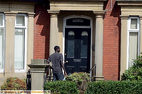 DON’T mind us . . . one of 16 asylum seekers to have moved in to Park Lane House, Royton