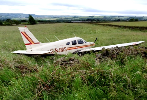 The damaged plane ended up in a field The damaged plane ended up in a field