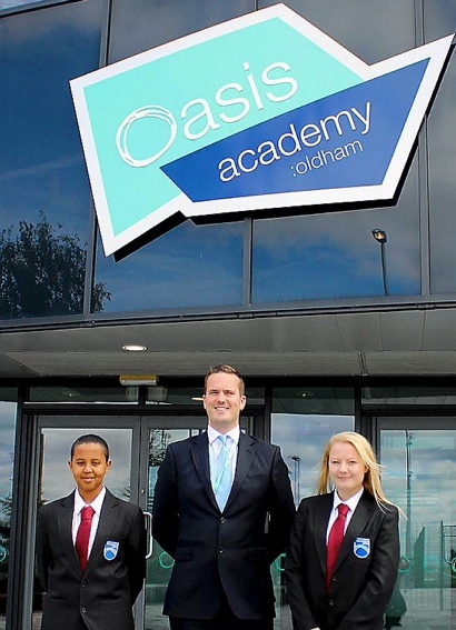 PRINCIPAL Nigel Whittle with head boy Abdul Mehmood and head girl Hannah Evans