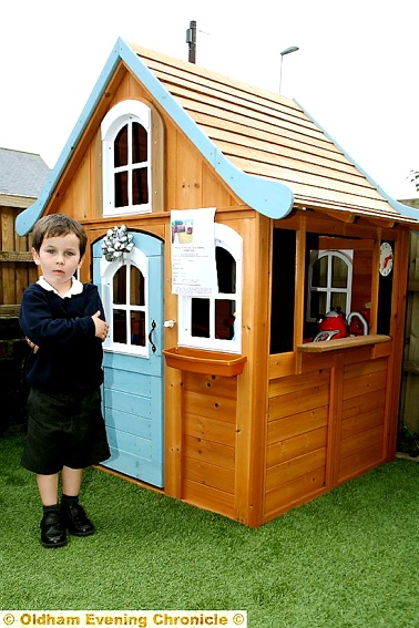 BIRTHDAY present . . . neighbours complain about Jacob Heron’s (4) playhouse