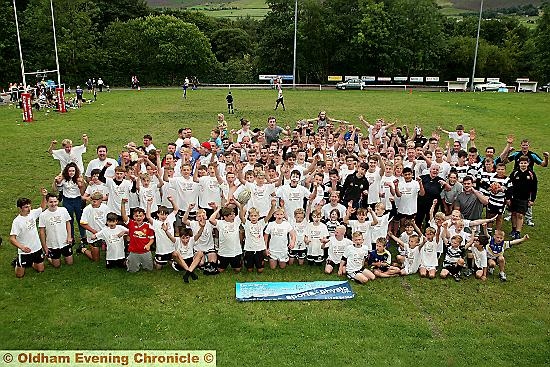 we’ve done it: players and volunteers celebrate after completing a game of touch rugby which lasted more than 30 hours. 