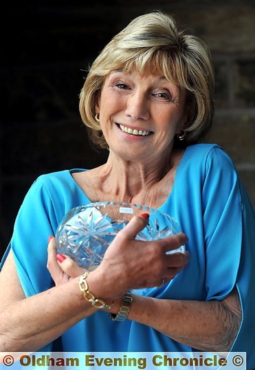ROSEBOWL winner: Joan Halkyard’s selfless fund-raising efforts saw her clinch the coveted Woman of Oldham title. ROSEBOWL winner: Joan Halkyard’s selfless fund-raising efforts saw her clinch the coveted Woman of Oldham title.