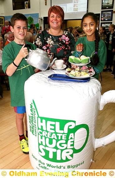 CAUSING a stir . . . Declan Curley, Donna McCarthy and Myrah Iqbal at St Joseph’s RC Primary School, Shaw