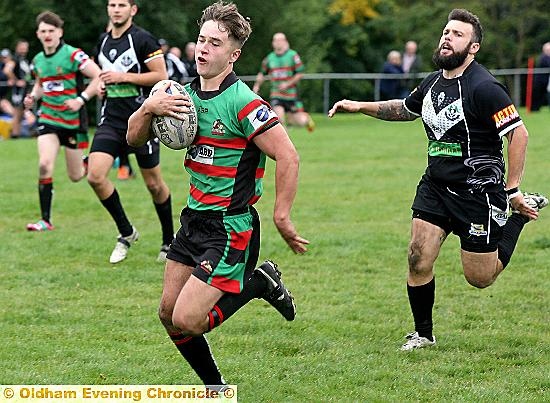 HARRY Godfrey races in for his first Waterhead try. 
