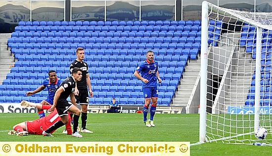 IT’S THERE: Dominic Poleon turns away to celebrate after equalising against Wigan.