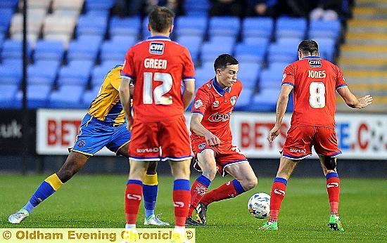 BRIGHT SPOT . . . George Edmundson (with ball) made an encouraging debut in an otherwise disappointing Athletic performance against Shrewsbury last night.