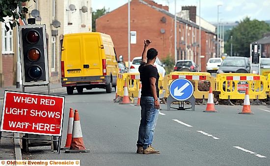 LIGHTS OUT? This is a job for carwash workers...