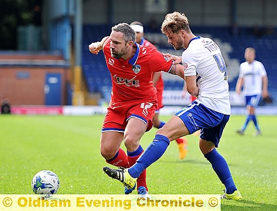 STILL GOING STRONG . . . Athletic’s David Dunn displays his skills against Bury. STILL GOING STRONG . . . Athletic’s David Dunn displays his skills against Bury.