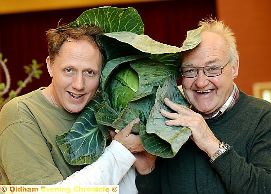 Denshaw flower and home produce show chairman Andrew Vance and committee member Joe Halshall with a fine cabbage specimen Denshaw flower and home produce show chairman Andrew Vance and committee member Joe Halshall with a fine cabbage specimen
