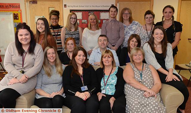 PRIDE in Oldham nominees, staff at Springbrook Primary School. Head of school Toni Thomason (seated, third from left) with her team