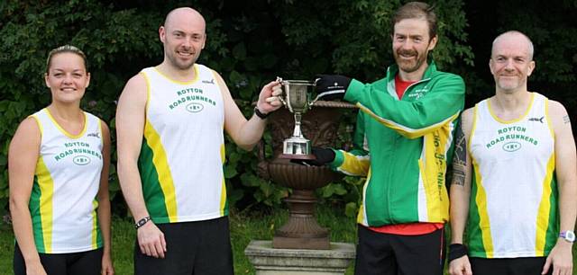 JUST CHAMPION . . . Dave Watt (second left) receives the RRR Cup trophy from club chairman and last year's winner Bryan Lawton. Beaten finalist Chloe Clegg (far left) is also pictured, along with third-placed Elliot Stone (far right)