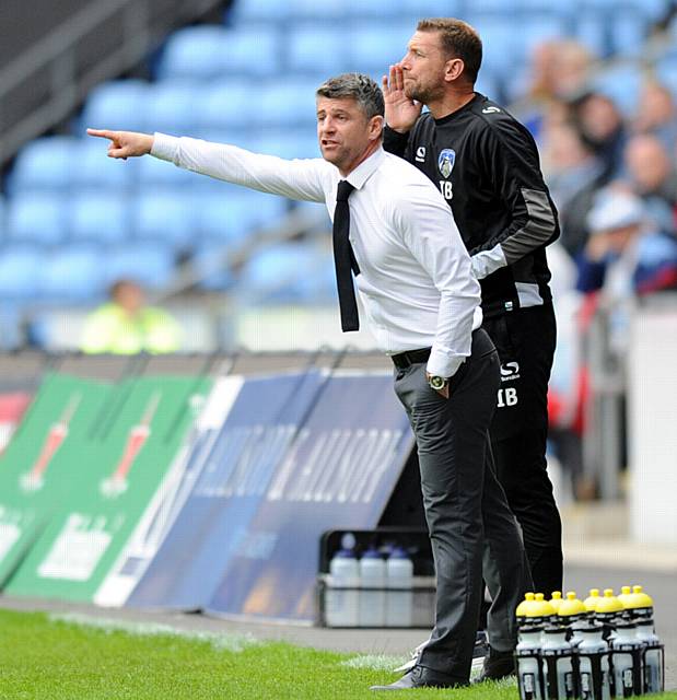 POINTING THE WAY: Athletic boss Stephen Robinson issues instructions