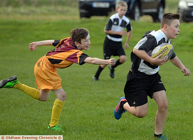 ON THE CHARGE . . . Failsworth's Zach Rowbottom in the match against Hathershaw ON THE CHARGE . . . Failsworth's Zach Rowbottom in the match against Hathershaw
