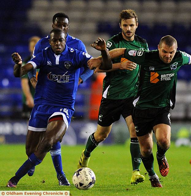 ON THE RUN . . . Ousmane Fane makes a break as Athletic attack