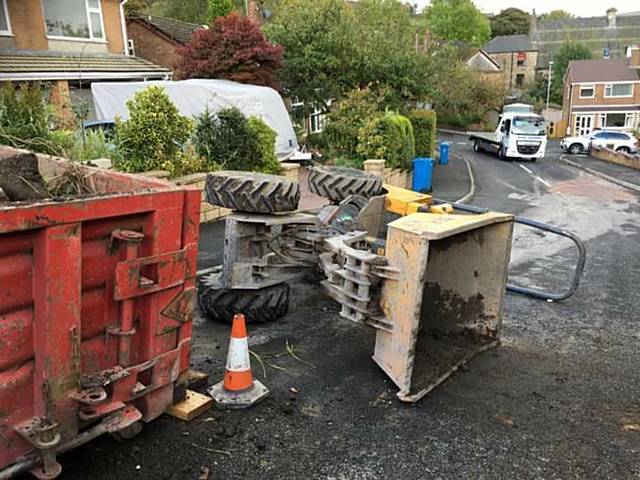 A 60-year-old man was trapped underneath the digger in Primrose Avenue, Uppermill A 60-year-old man was trapped underneath the digger in Primrose Avenue, Uppermill