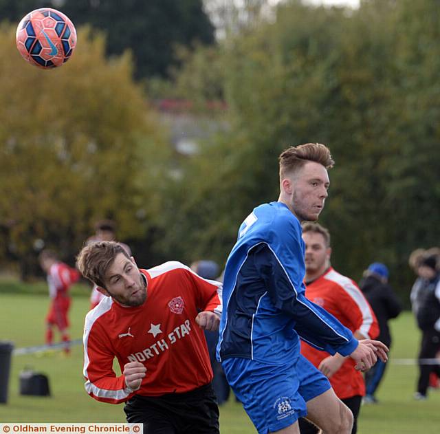 HEADS UP . . . an aerial confrontation sees Daniel Coleman (left) , of North Star, try to win a header