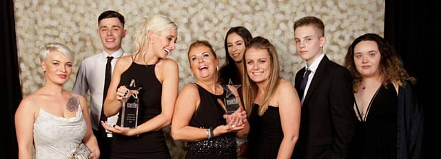 WINNERS! From left, Chantelle Carter, Lewis Bostock, Laura Delaney, Yvonne Cookson, Gemma Bennett, Fiona Heyes, Joshua Thomas and Francesca Harrison. Mossley Tax Shop at North West Finance awards