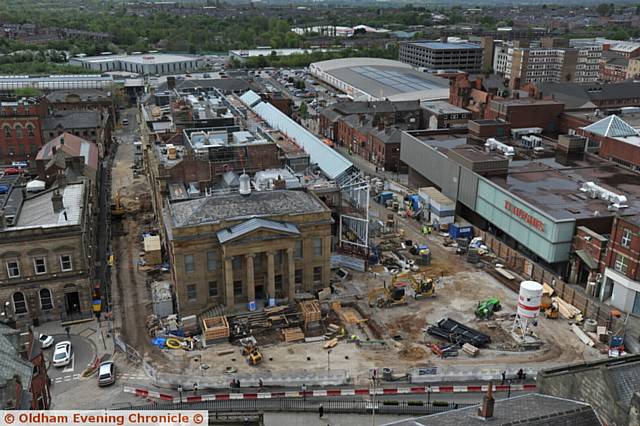 Oldham Parish Church bell tower view shows old Town Hall cinema development...