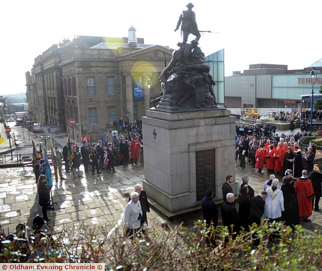 THE scene at Oldham's war memorial yesterday THE scene at Oldham's war memorial yesterday