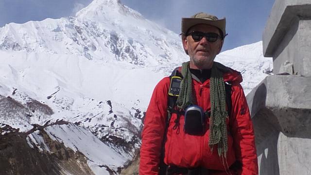 HEADY heights . . . Andrew Taylor climbing in Nepal