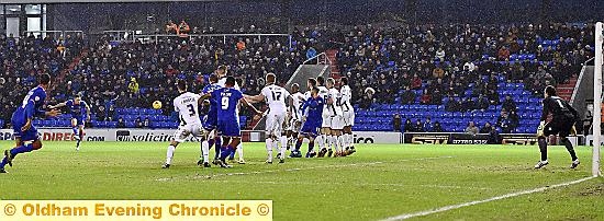 Mike Jones scores with a stunning free-kick