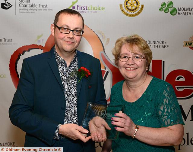 SO SHOCKED . . . Freeman Meacher Ambassador Award winner Mick Harwood, with presenter Jean Stretton, leader of Oldham Council.