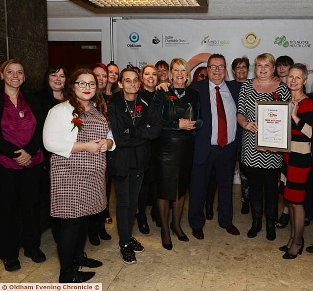 FINALISTS Inspire Women, Miller House staff and OL1-Oldham with presenter Chris Hamilton, chairman of Oldham RLFC (front row)