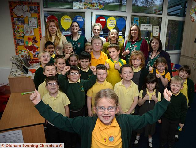 FIRBANK School's Out before and after-school club celebrate an outstanding Ofsted rating; (front) Keira Hopwood (7) leads the cheers