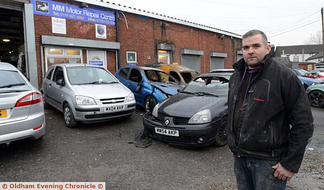 Matthew Dale outside his garage MM Motor Repair Centre, where some cars were torched over the weekend.